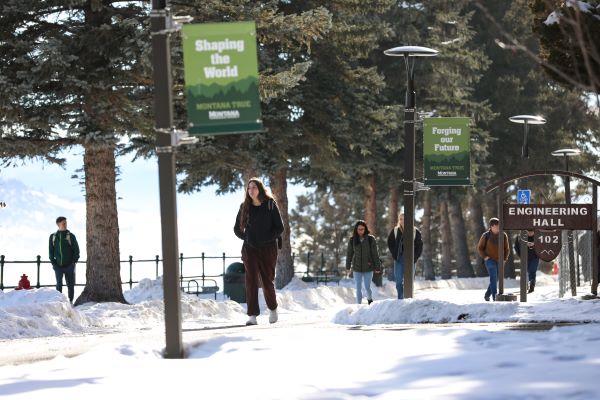 Students walk on a snowy Montana Tech campus