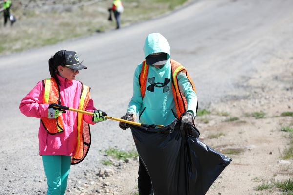 Students pick up trash.
