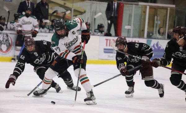 A Montana Tech hockey player in a game.