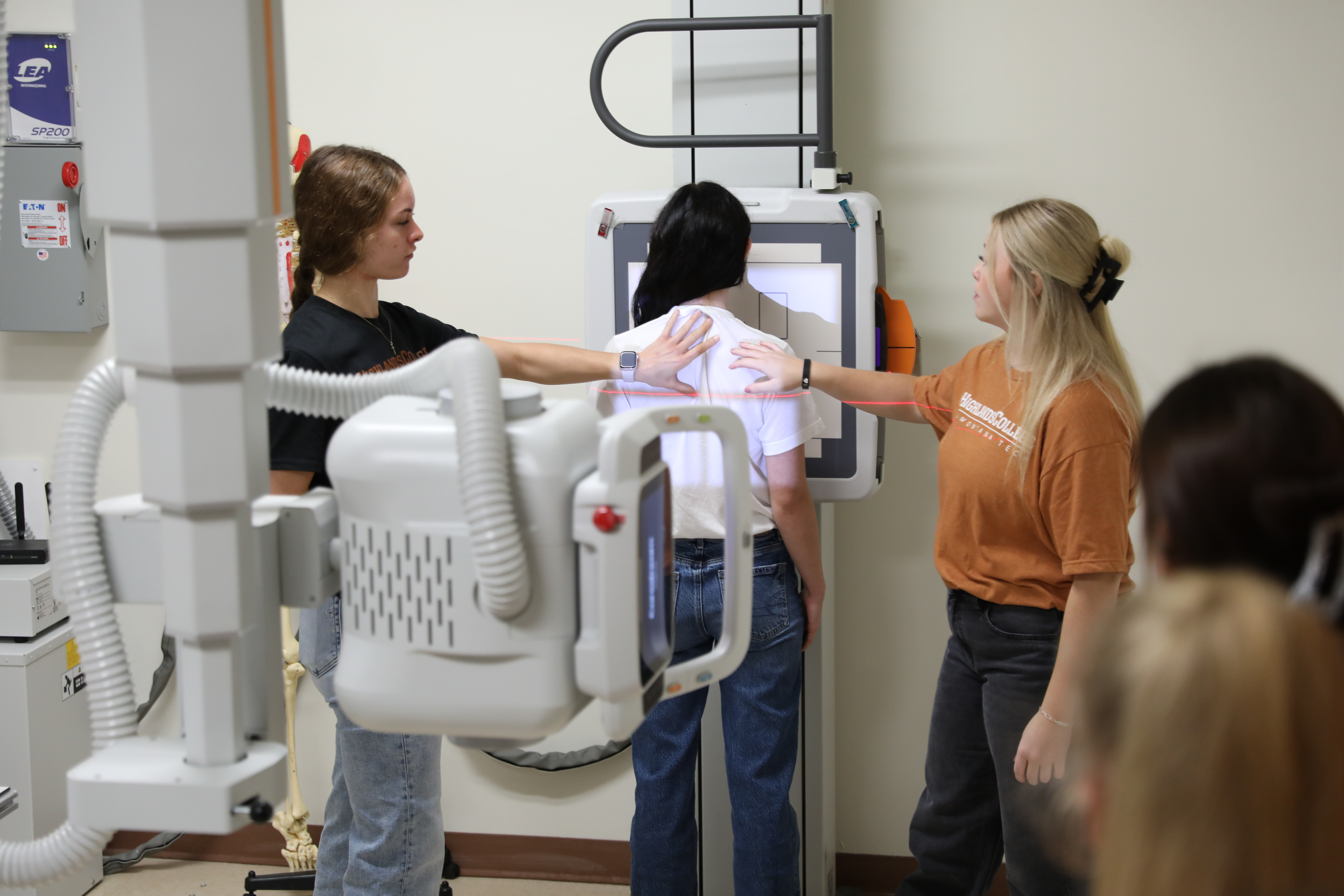 Students participate in an xray