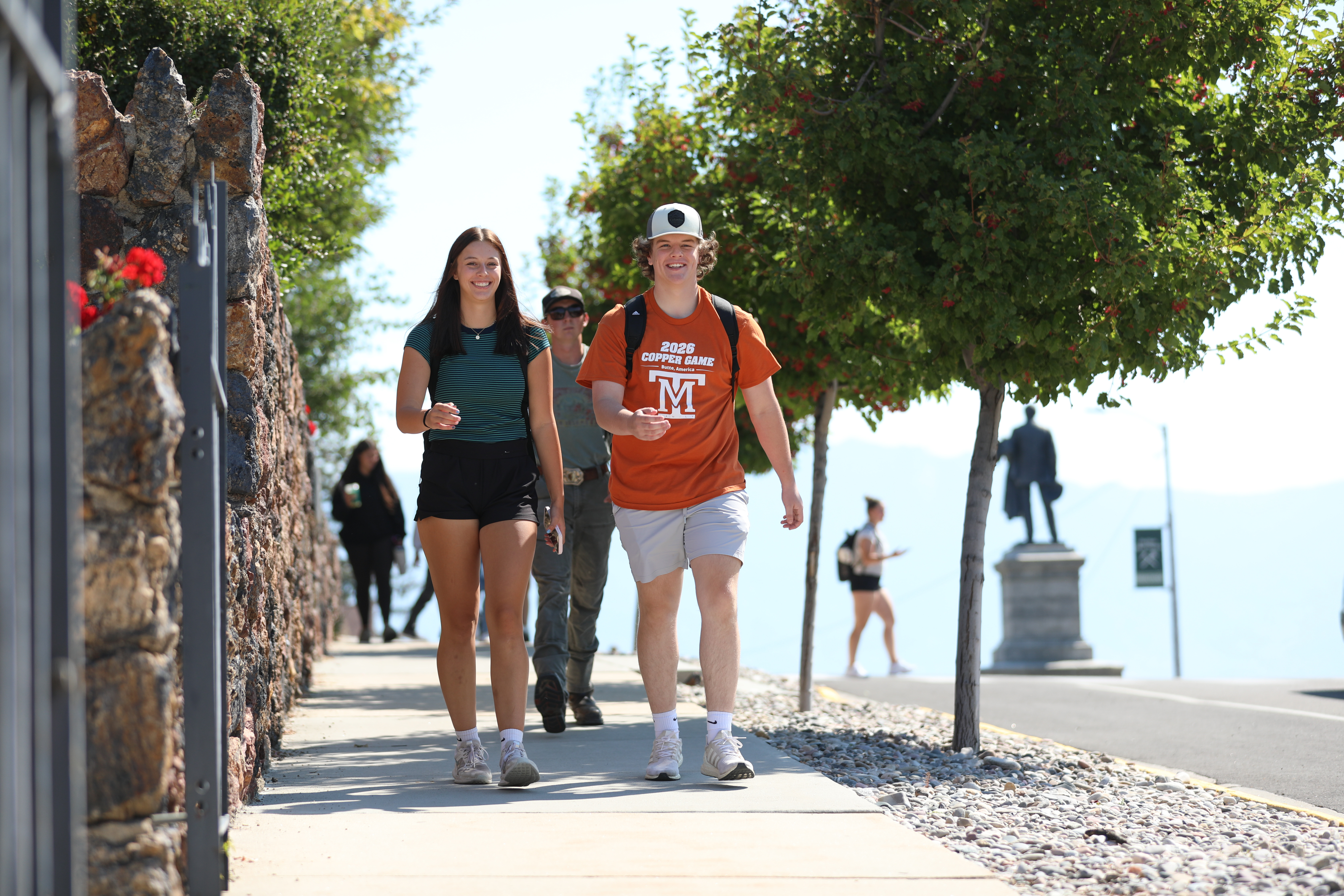 !Students walk on Montana TEch campus