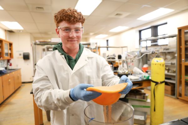 Kyle Mann holds a Scoby