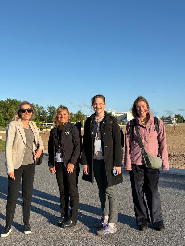 Four women pose for a photo in Finland