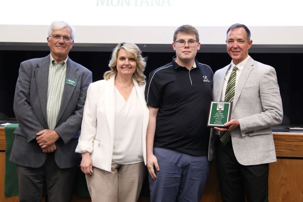 Tim Elgren, Jennifer Simon, Dylan Baldwin and Les Cook pose for a photo