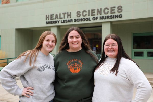 Three nursing students in Montana Tech sweaters 