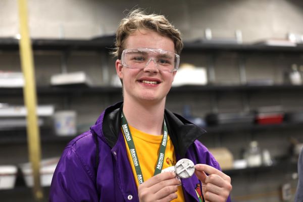 !student with a medallion