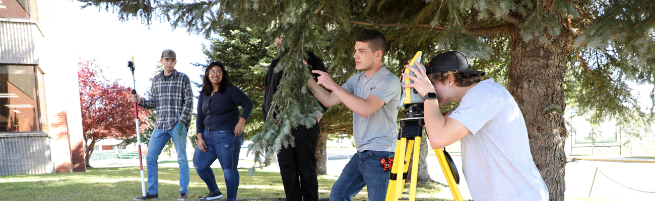 Students surveying Montana Tech's campus