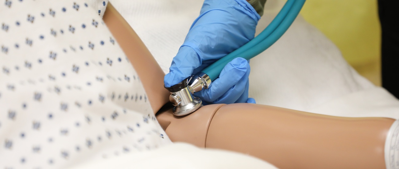 a CNA takes a pulse