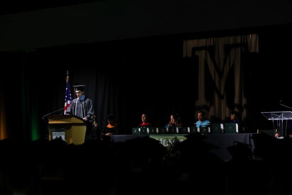 A commencement speaker delivers their address. 