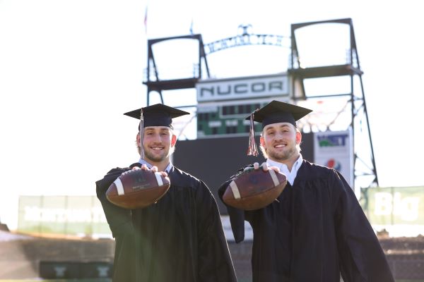 Cade and Cole Wyant in cap and gown