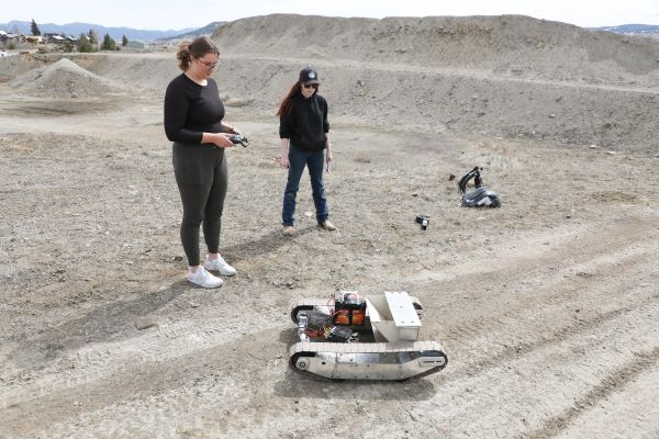 Students with a ground drone