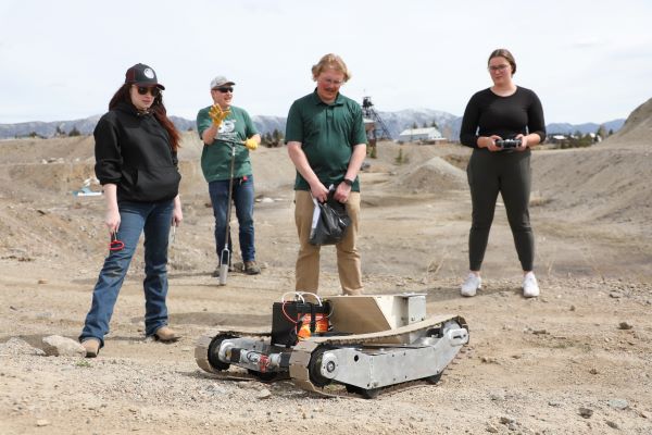 students with ground drone