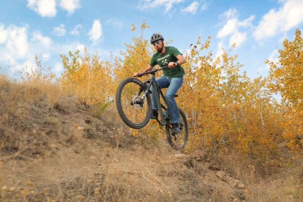 Sequoia Pflug jumps on his mountain bike