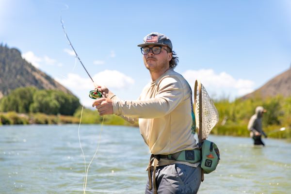 A student casts a fly rod