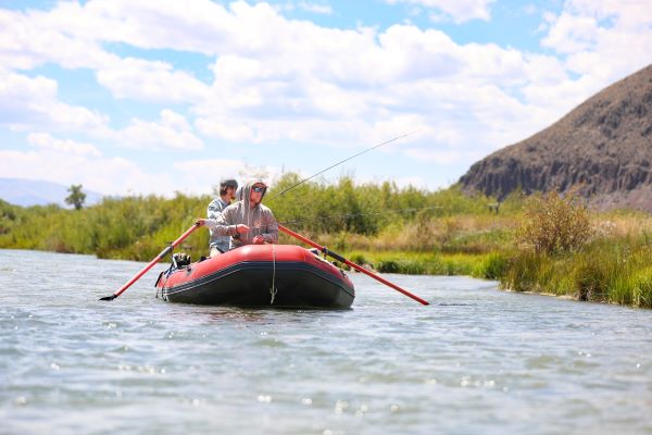 Students float on a raft. 