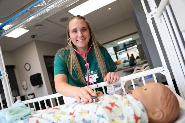 Kendra in the nursing simulation lab