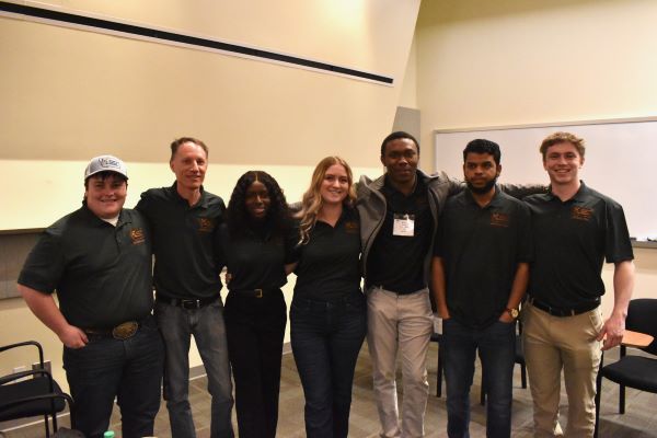 A group of students poses for a photo