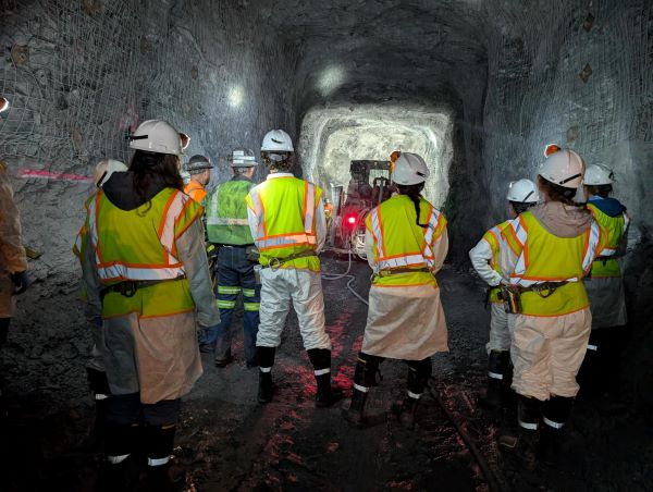 Students in an underground mine