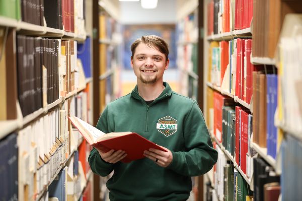 Quinn Cox in the library