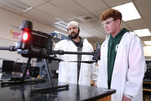 Students take a look at a drone