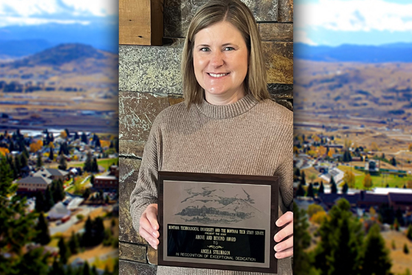 Angela Stillwagon holding award