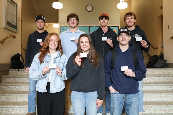 A group of students pose for a photo