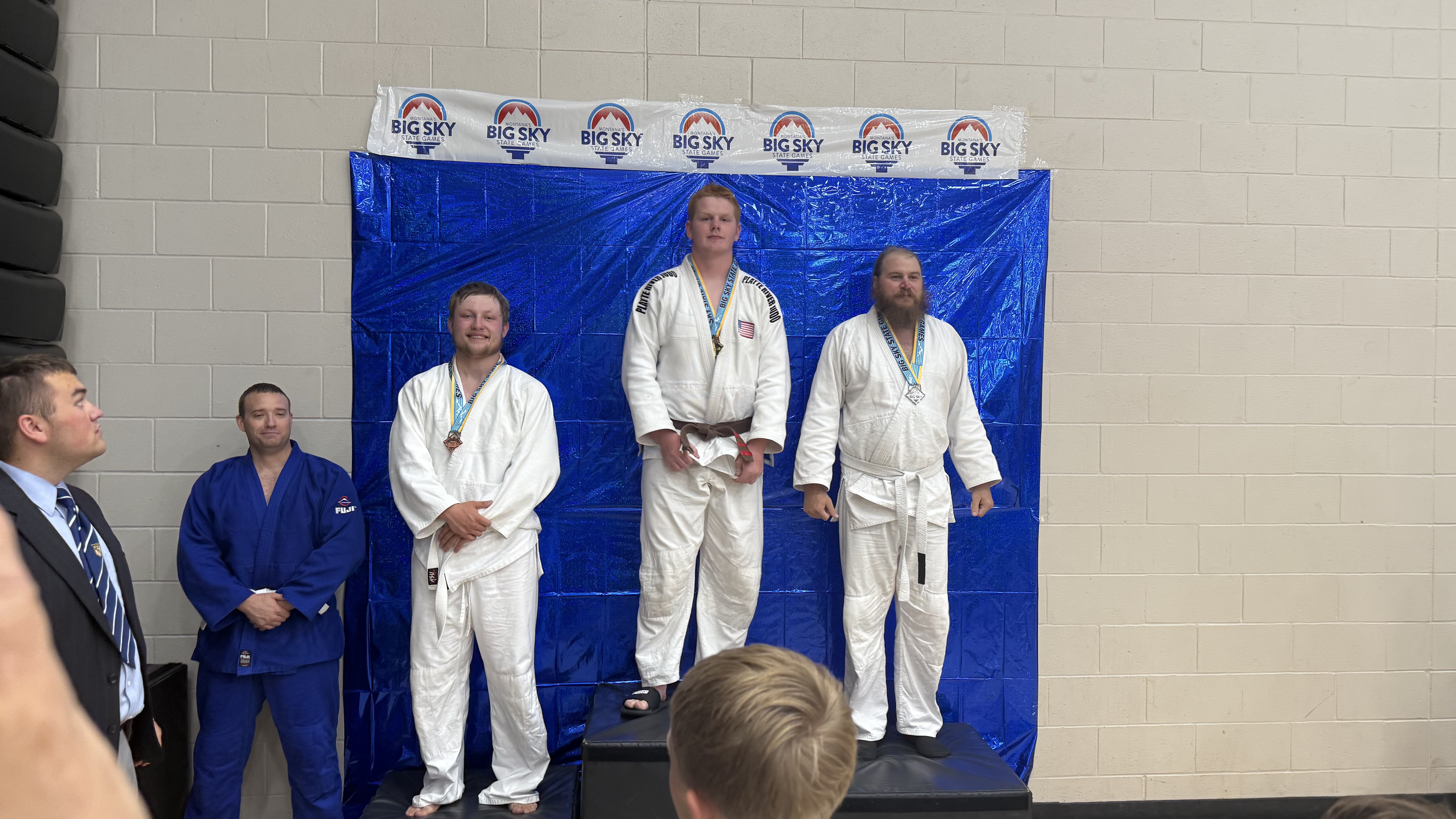 Gavin Rahl on the podium with other competitors