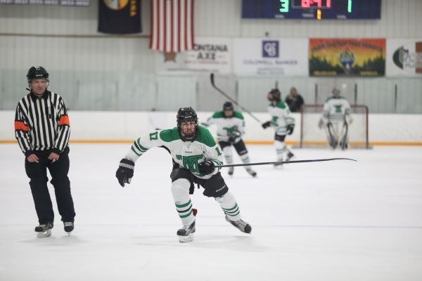 An Oredigger hockey player on the ice